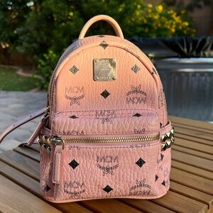 pink MCM mini backpack
